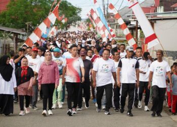 Bupati Iskandar Ajak Masyarakat Perkuat Rasa Gotong Royong Pada Momentum HUT Kecamatan Helumo